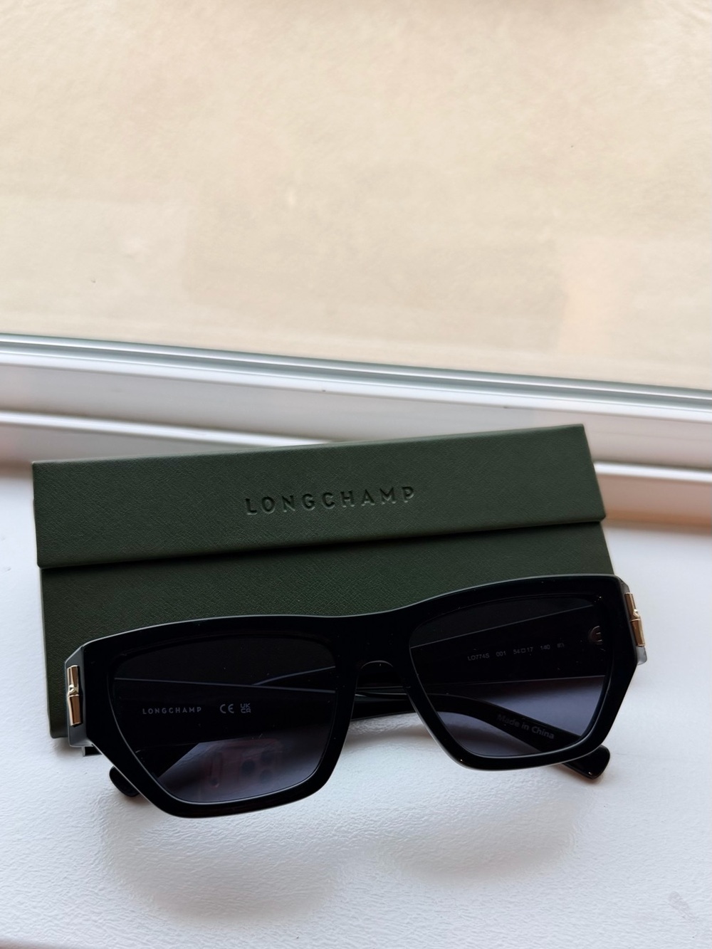 Longchamp Black Sunglasses with Gold Accents